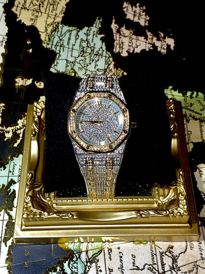 Two-tone silver and gold men's and women's watch with a diamond-studded dial and bezel. The watch features a sparkling design with crystal-encrusted links on the band, offering a luxurious, eye-catching appearance.