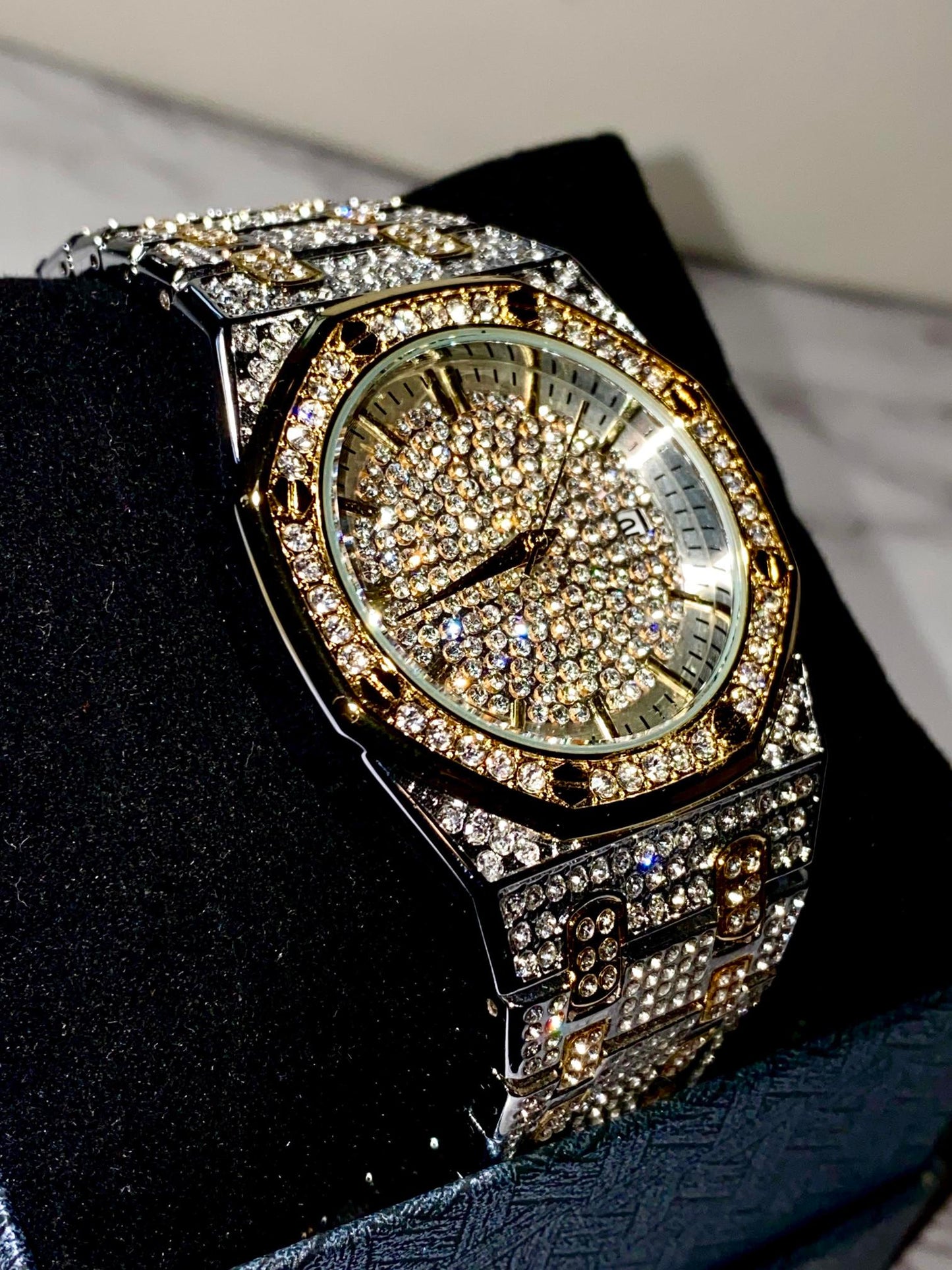 Two-tone silver and gold men's and women's watch with a diamond-studded dial and bezel. The watch features a sparkling design with crystal-encrusted links on the band, offering a luxurious, eye-catching appearance.