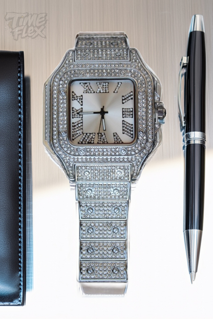 Silver-tone unisex watch with a square dial, crystal-encrusted bezel, and sparkling band. The watch features Roman numeral markers and a luxurious, diamond-studded design, offering a sleek and elegant look.
