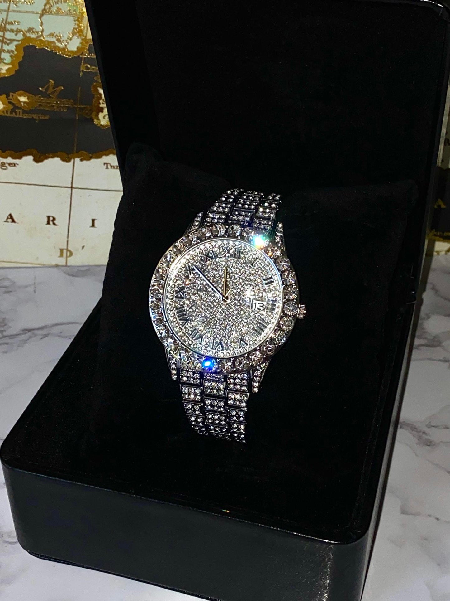 Silver iced-out watch with Roman numeral pavé dial and diamond bracelet – luxury streetwear timepiece