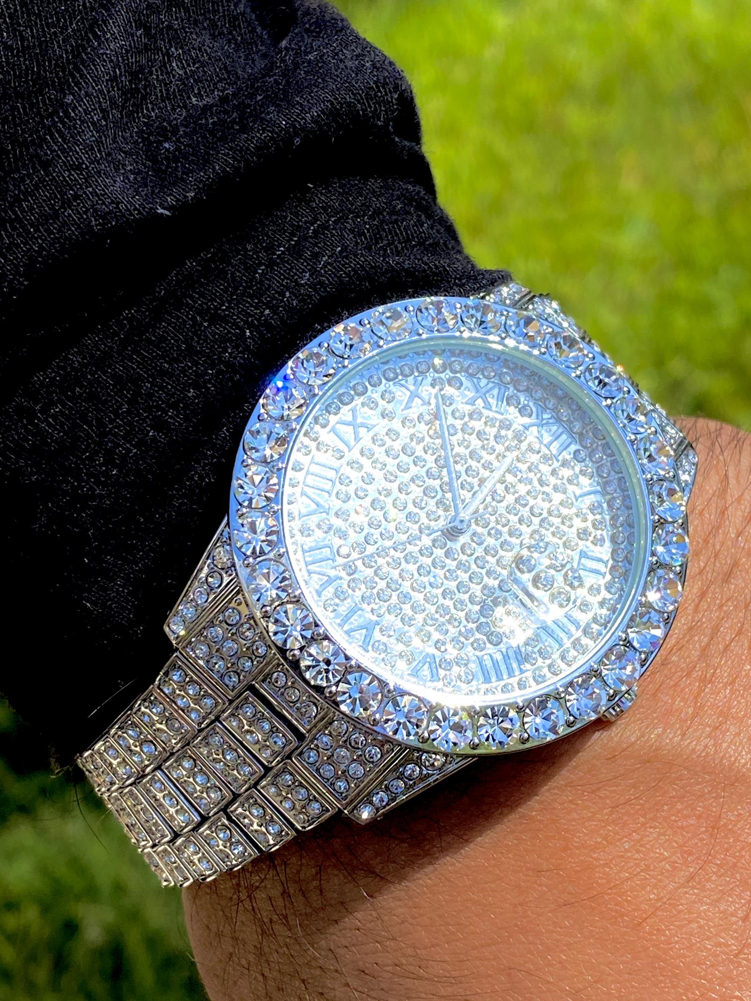 Silver iced-out watch with Roman numeral pavé dial and diamond bracelet – luxury streetwear timepiece