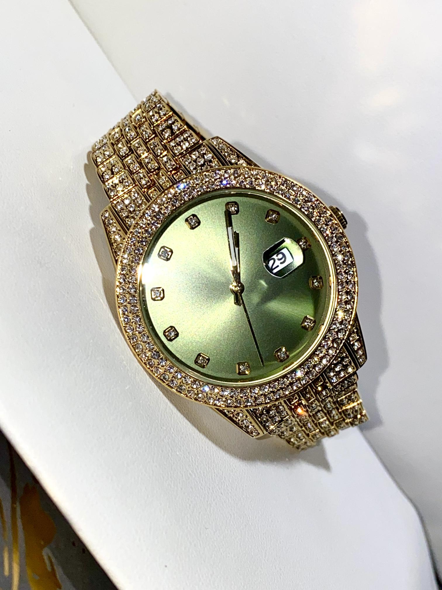 Gold iced-out 42MM watch with green dial, crystal markers, and pavé band – luxury streetwear style