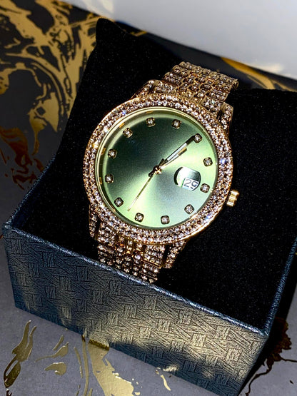 Gold iced-out 42MM watch with green dial, crystal markers, and pavé band – luxury streetwear style