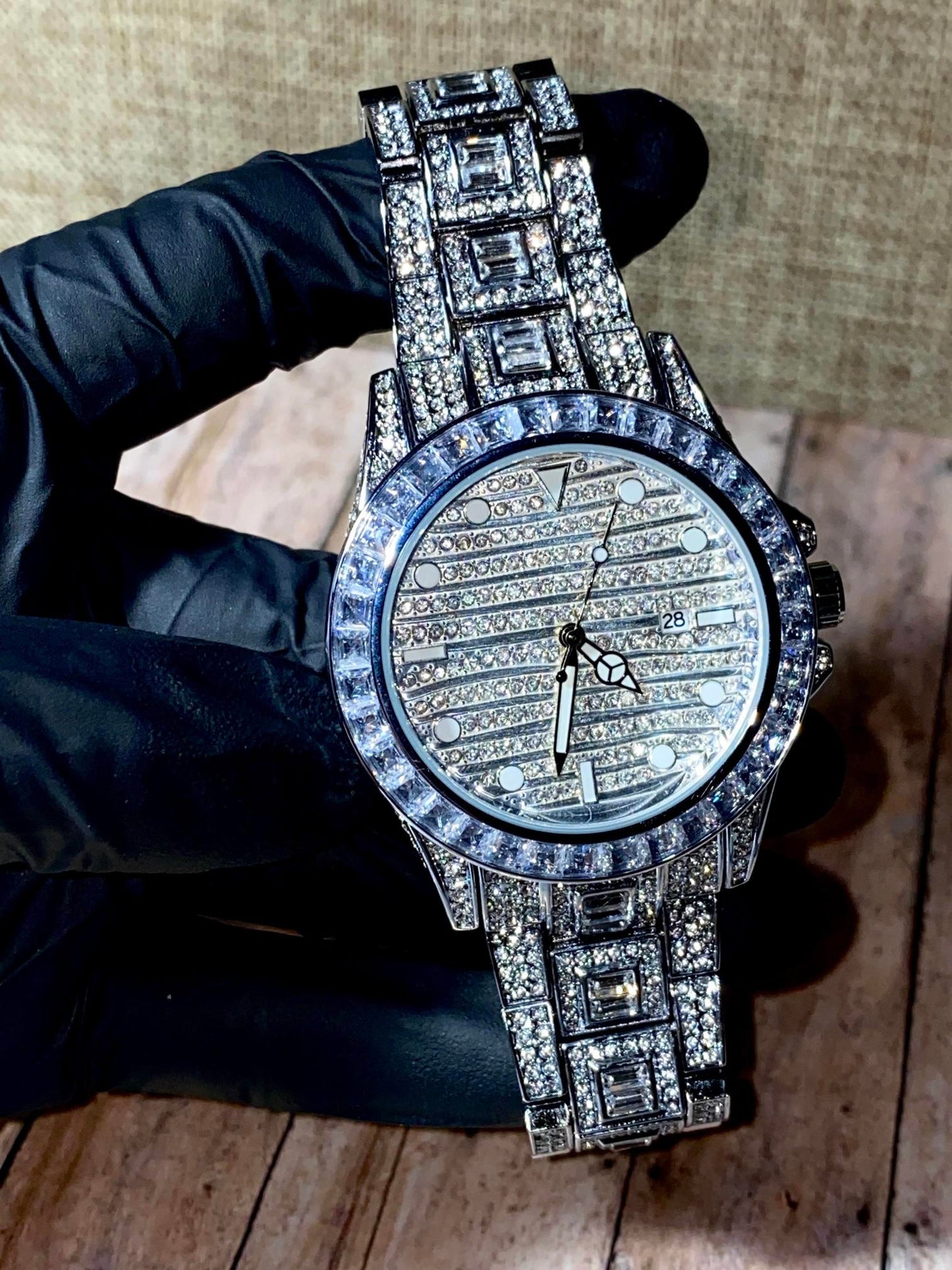 Silver iced-out watch with grid pavé dial, baguette bezel, and diamond bracelet – luxury streetwear timepiece