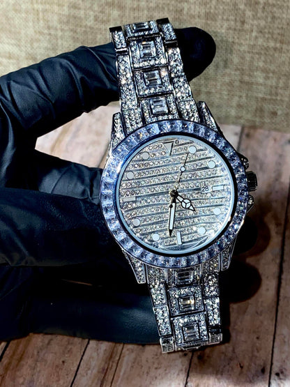 Silver iced-out watch with grid pavé dial, baguette bezel, and diamond bracelet – luxury streetwear timepiece