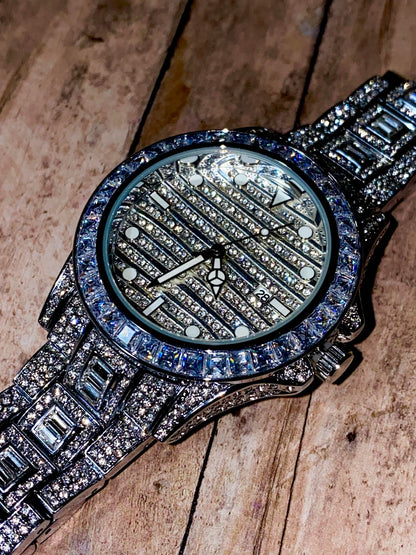 Silver iced-out watch with grid pavé dial, baguette bezel, and diamond bracelet – luxury streetwear timepiece