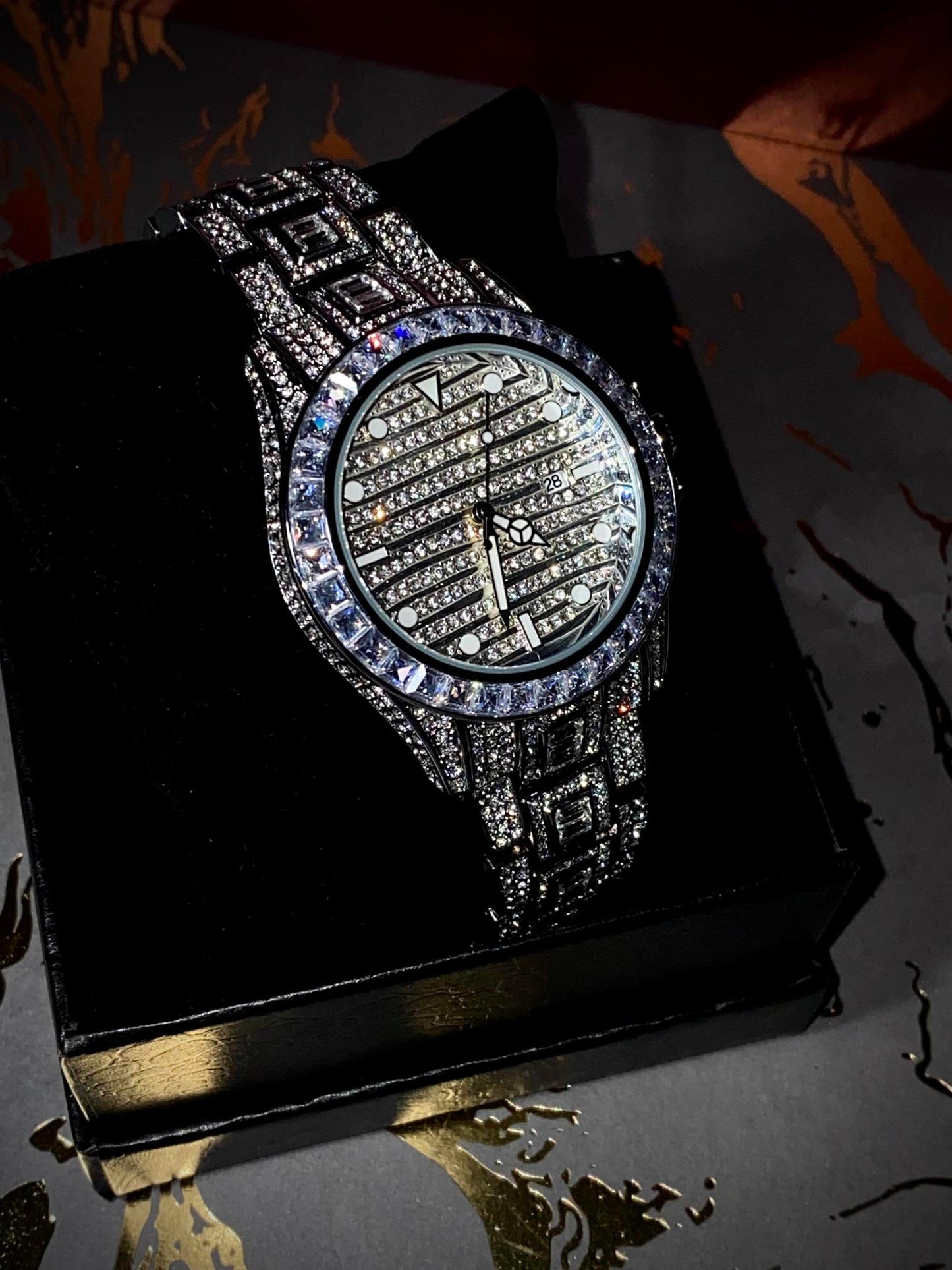 Silver iced-out watch with grid pavé dial, baguette bezel, and diamond bracelet – luxury streetwear timepiece