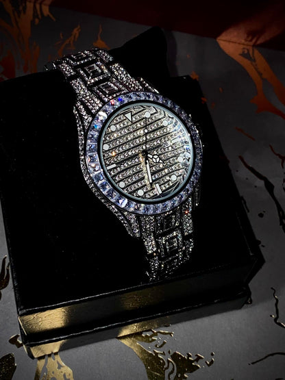 Silver iced-out watch with grid pavé dial, baguette bezel, and diamond bracelet – luxury streetwear timepiece
