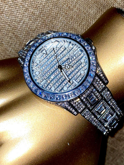 Silver iced-out watch with grid pavé dial, baguette bezel, and diamond bracelet – luxury streetwear timepiece