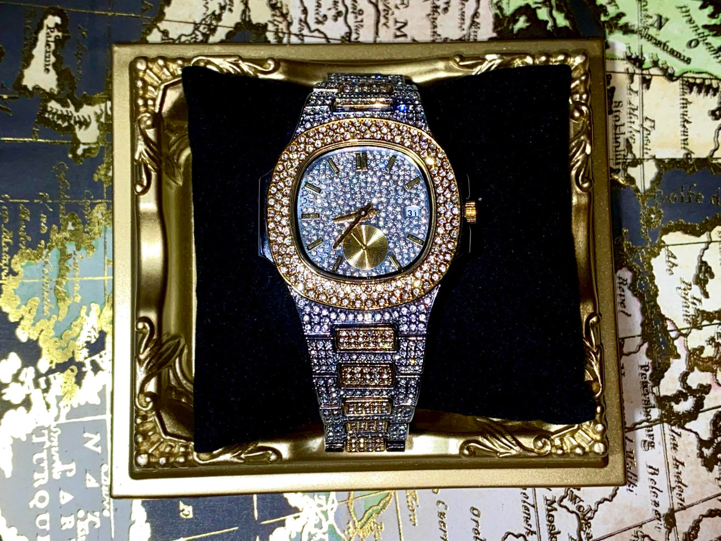 Two-tone iced-out watch with gold bezel accents, diamond pavé dial, and gold subdial – luxury streetwear style