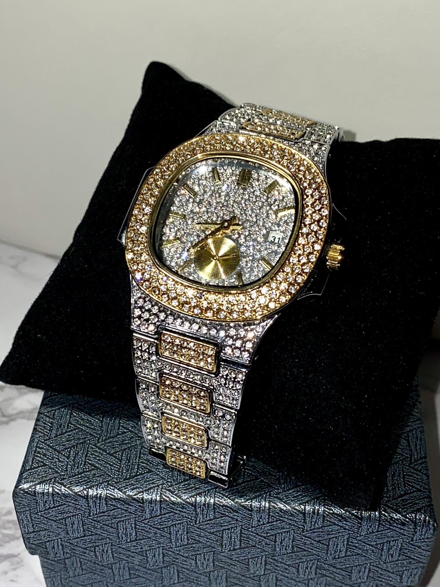 Two-tone iced-out watch with gold bezel accents, diamond pavé dial, and gold subdial – luxury streetwear style