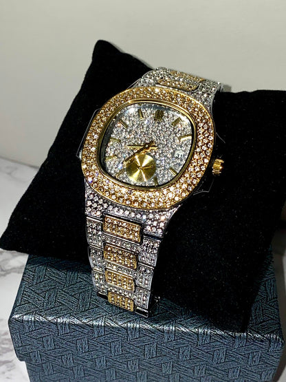 Two-tone iced-out watch with gold bezel accents, diamond pavé dial, and gold subdial – luxury streetwear style