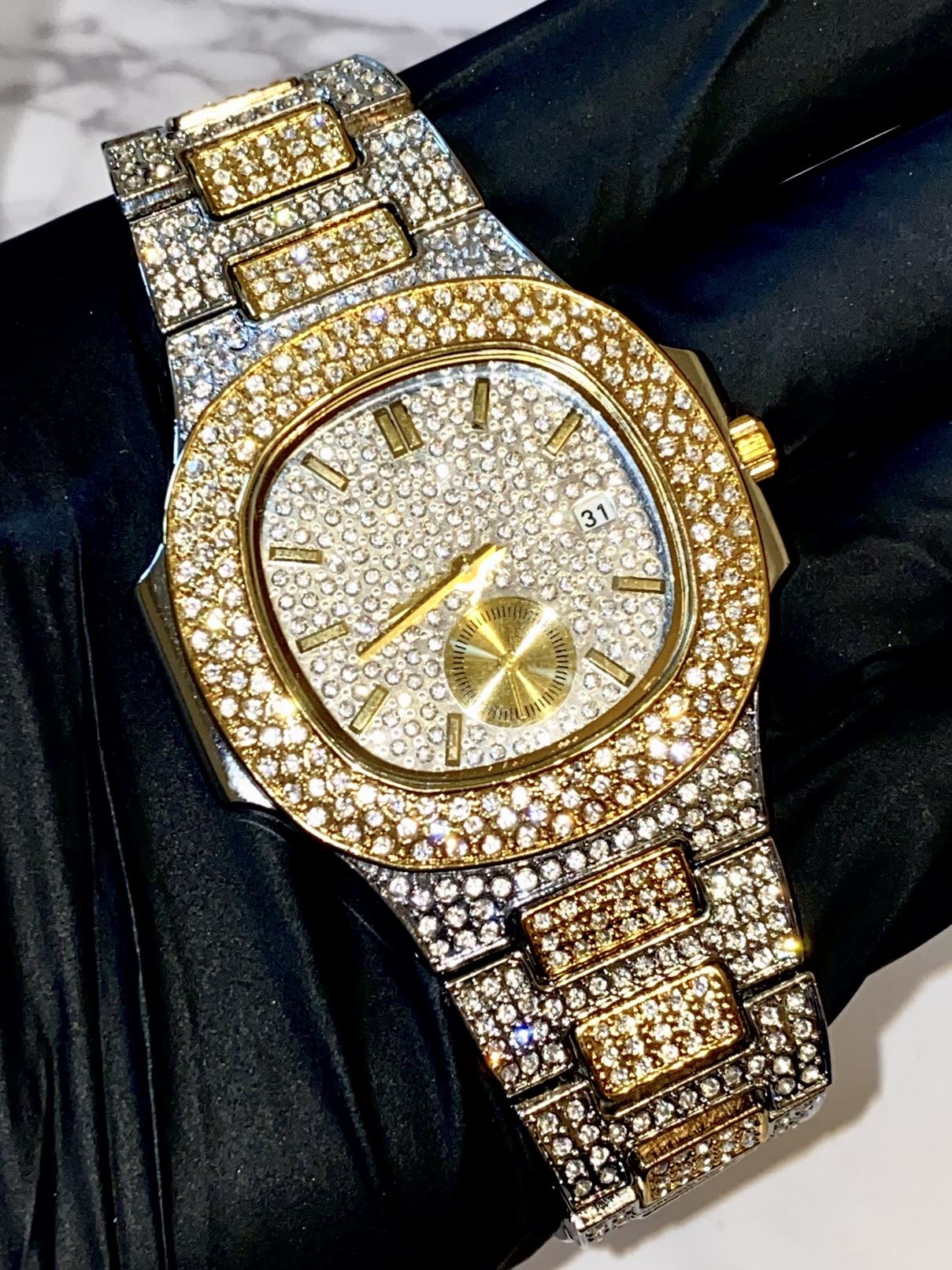 Two-tone iced-out watch with gold bezel accents, diamond pavé dial, and gold subdial – luxury streetwear style