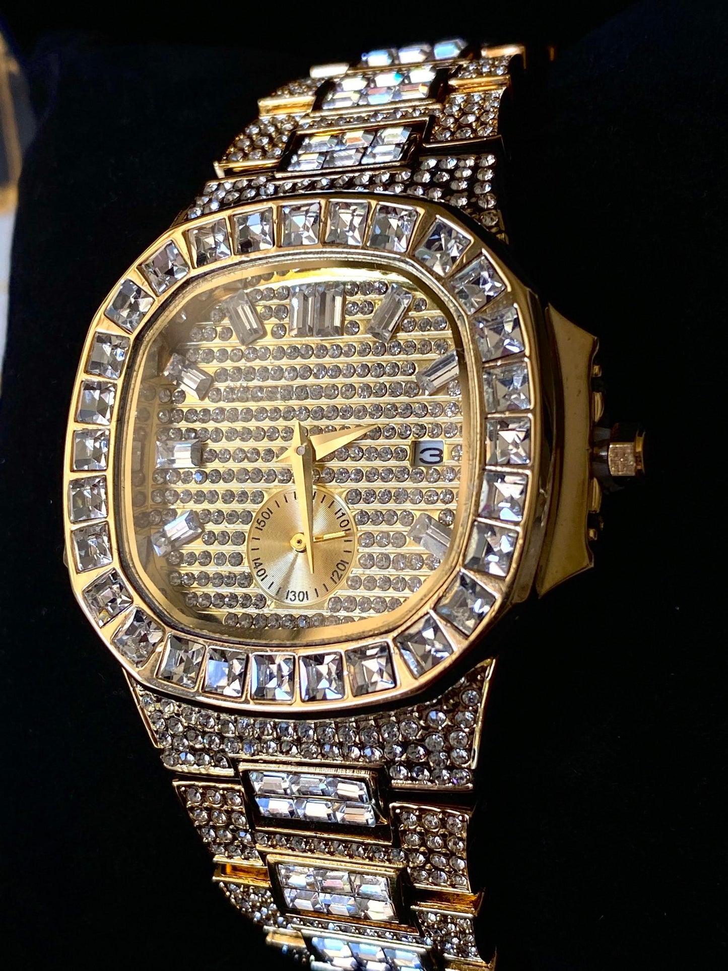 Gold iced-out watch with baguette bezel, grid pavé dial, and diamond bracelet – luxury streetwear timepiece