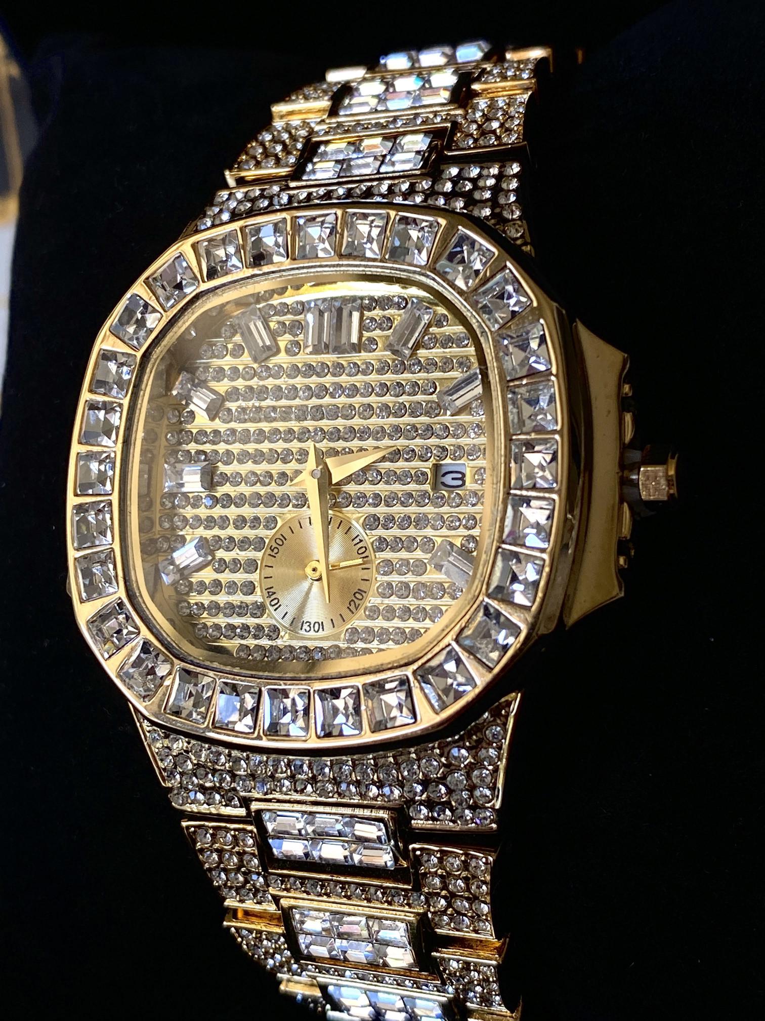 Gold iced-out watch with baguette bezel, grid pavé dial, and diamond bracelet – luxury streetwear timepiece