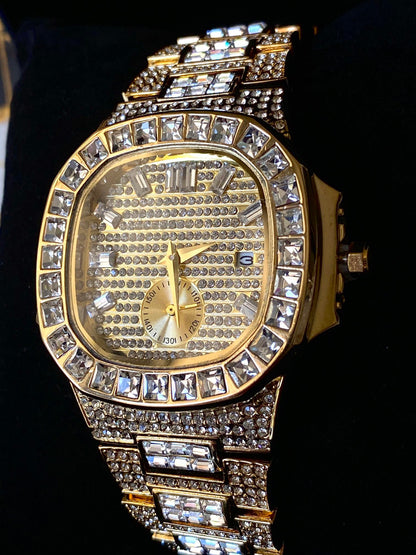Gold iced-out watch with baguette bezel, grid pavé dial, and diamond bracelet – luxury streetwear timepiece
