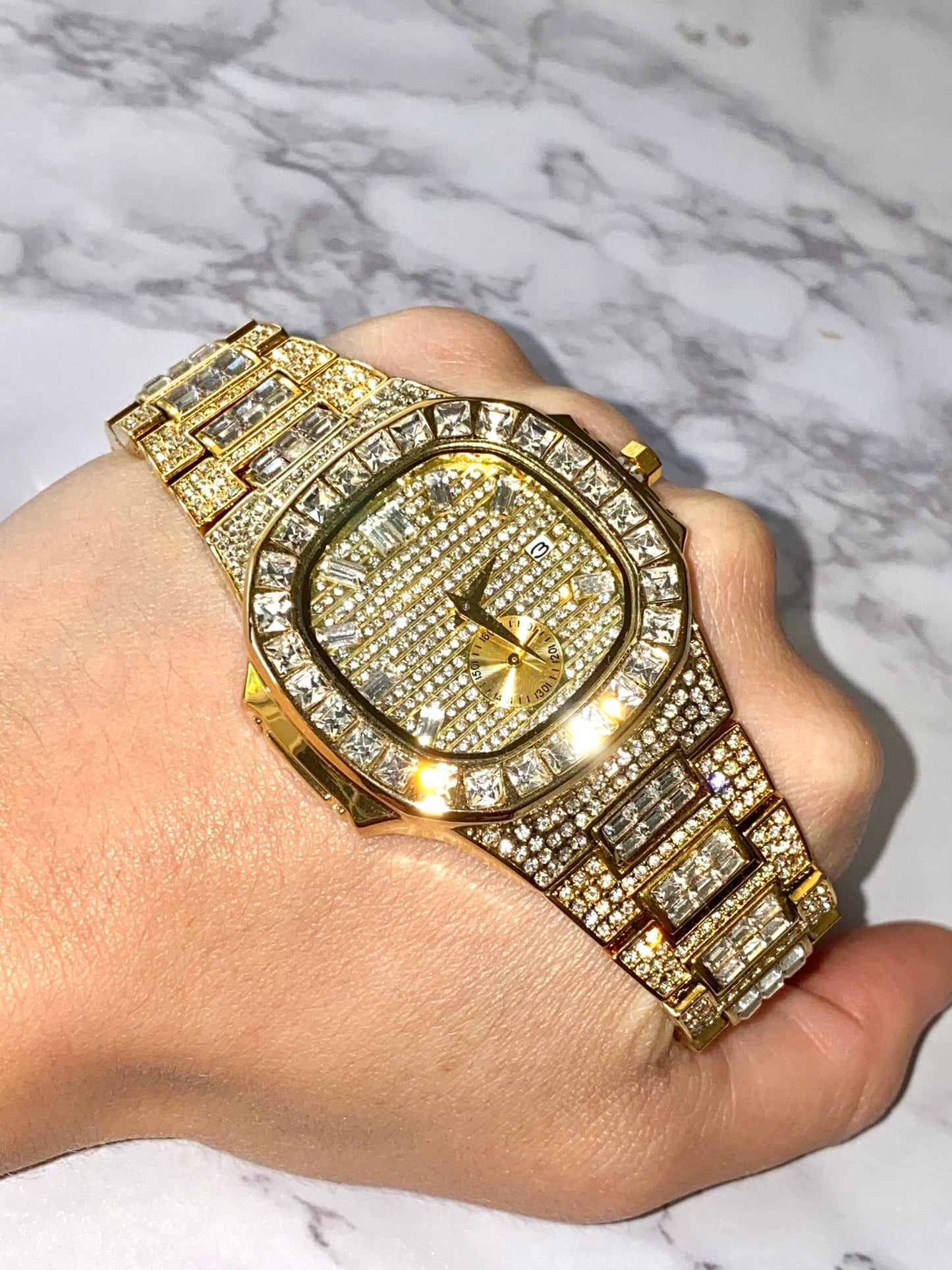 Gold iced-out watch with baguette bezel, grid pavé dial, and diamond bracelet – luxury streetwear timepiece