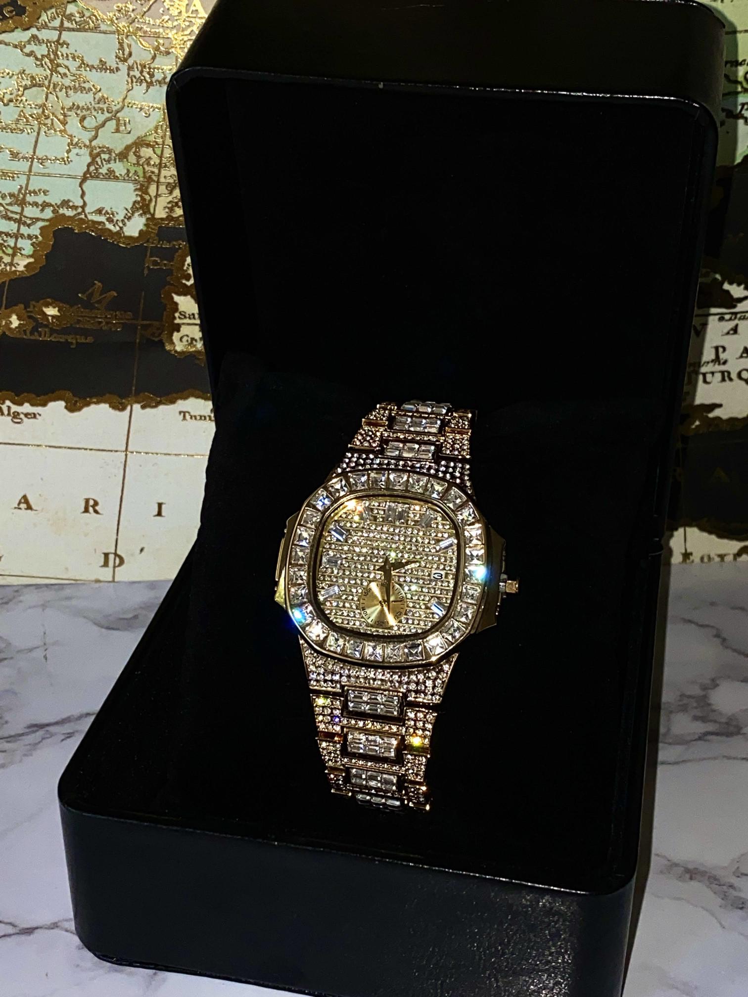 Gold iced-out watch with baguette bezel, grid pavé dial, and diamond bracelet – luxury streetwear timepiece
