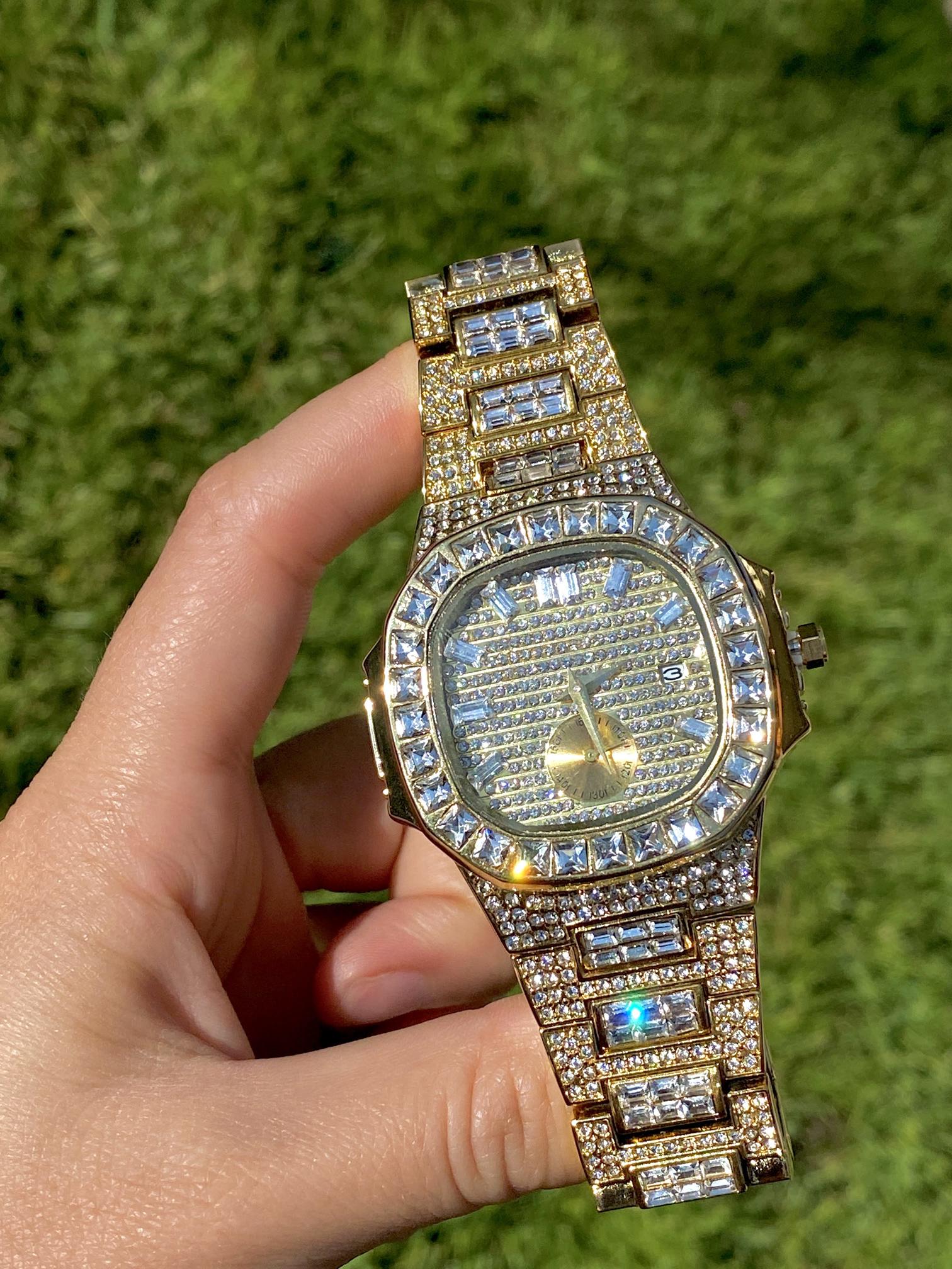 Gold iced-out watch with baguette bezel, grid pavé dial, and diamond bracelet – luxury streetwear timepiece