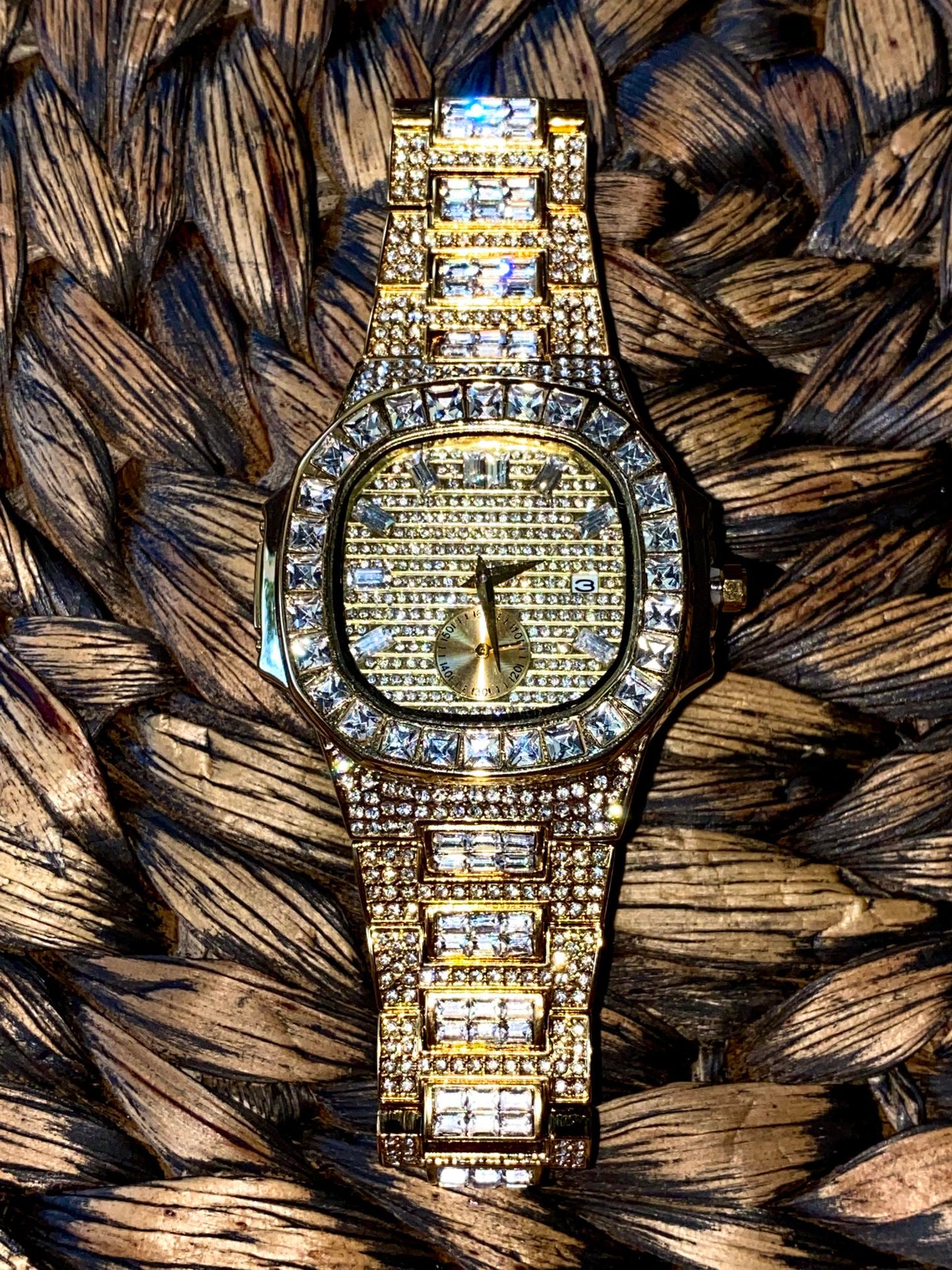 Gold iced-out watch with baguette bezel, grid pavé dial, and diamond bracelet – luxury streetwear timepiece