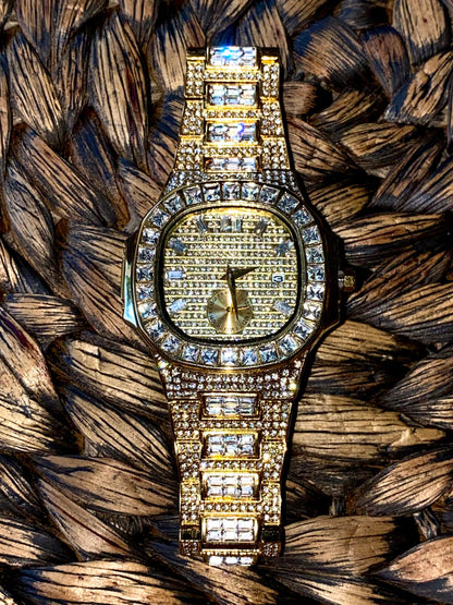 Gold iced-out watch with baguette bezel, grid pavé dial, and diamond bracelet – luxury streetwear timepiece