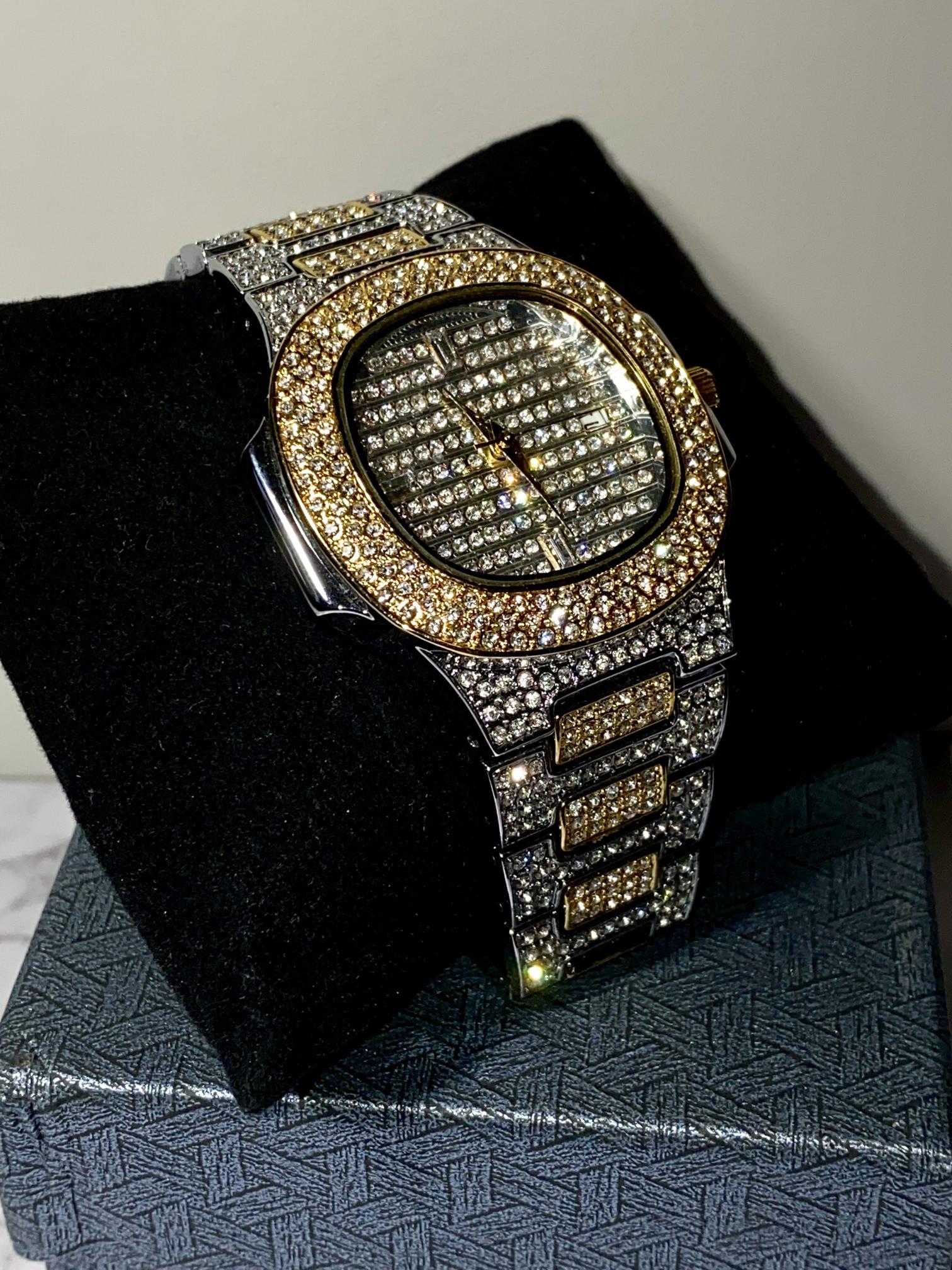 Two-tone iced-out watch with gold bezel, grid pavé dial, and diamond bracelet – luxury streetwear style