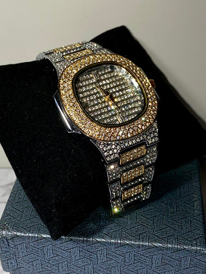 Two-tone iced-out watch with gold bezel, grid pavé dial, and diamond bracelet – luxury streetwear style