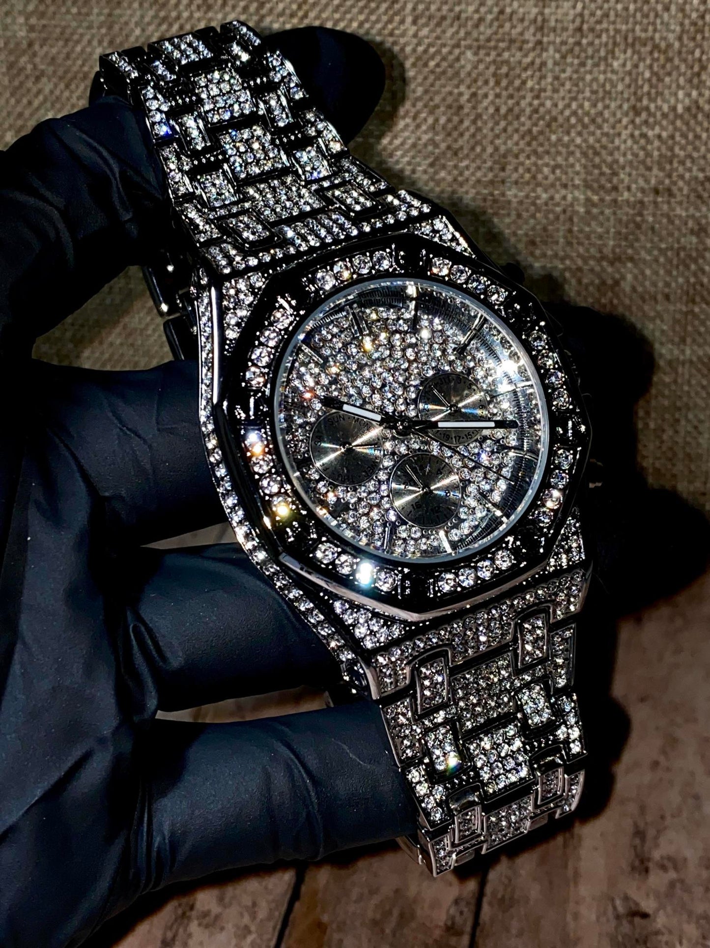 Silver iced-out octagon chronograph watch with pavé dial and diamond bracelet – luxury streetwear timepiece