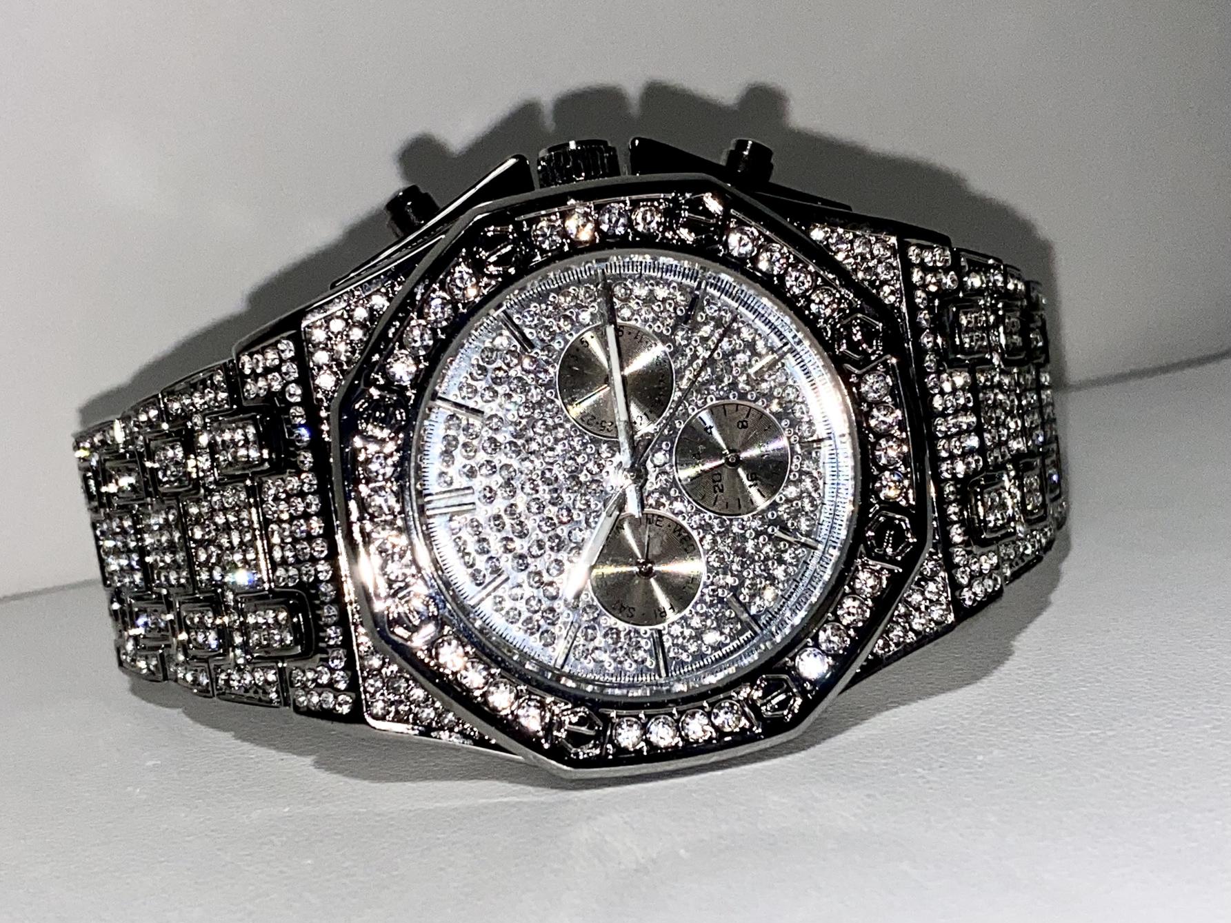Silver iced-out octagon chronograph watch with pavé dial and diamond bracelet – luxury streetwear timepiece