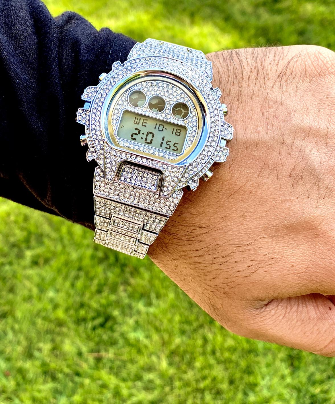 Silver iced-out digital watch with full pavé bezel and bracelet – luxury tech streetwear style