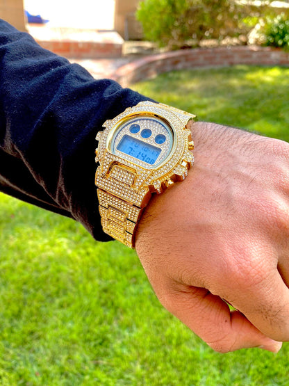 Gold iced-out digital watch with pavé bezel and bracelet – luxury tech streetwear style
