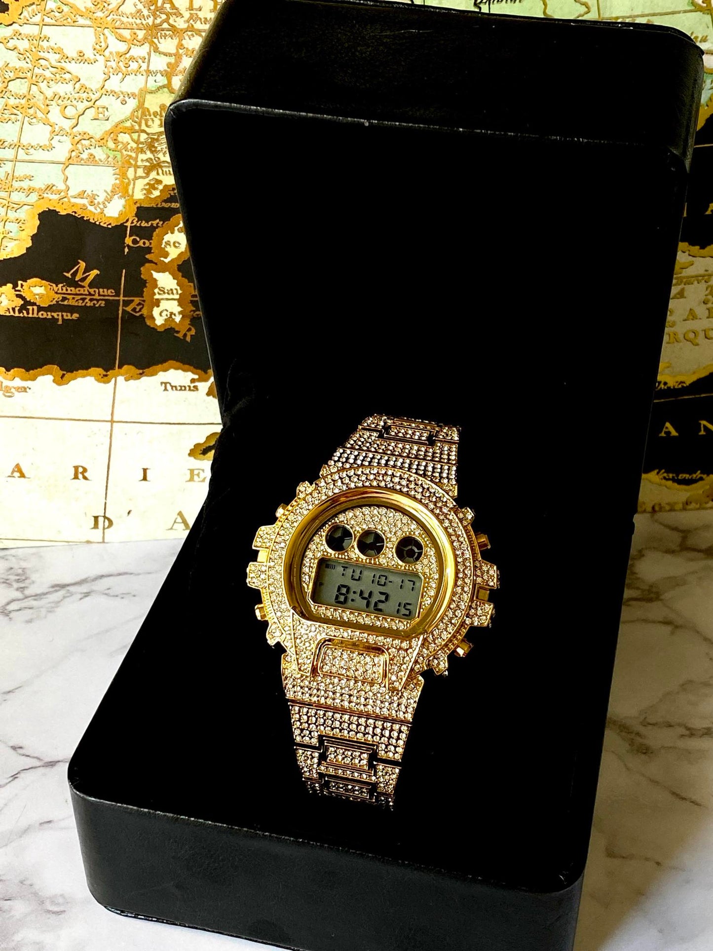 Gold iced-out digital watch with pavé bezel and bracelet – luxury tech streetwear style