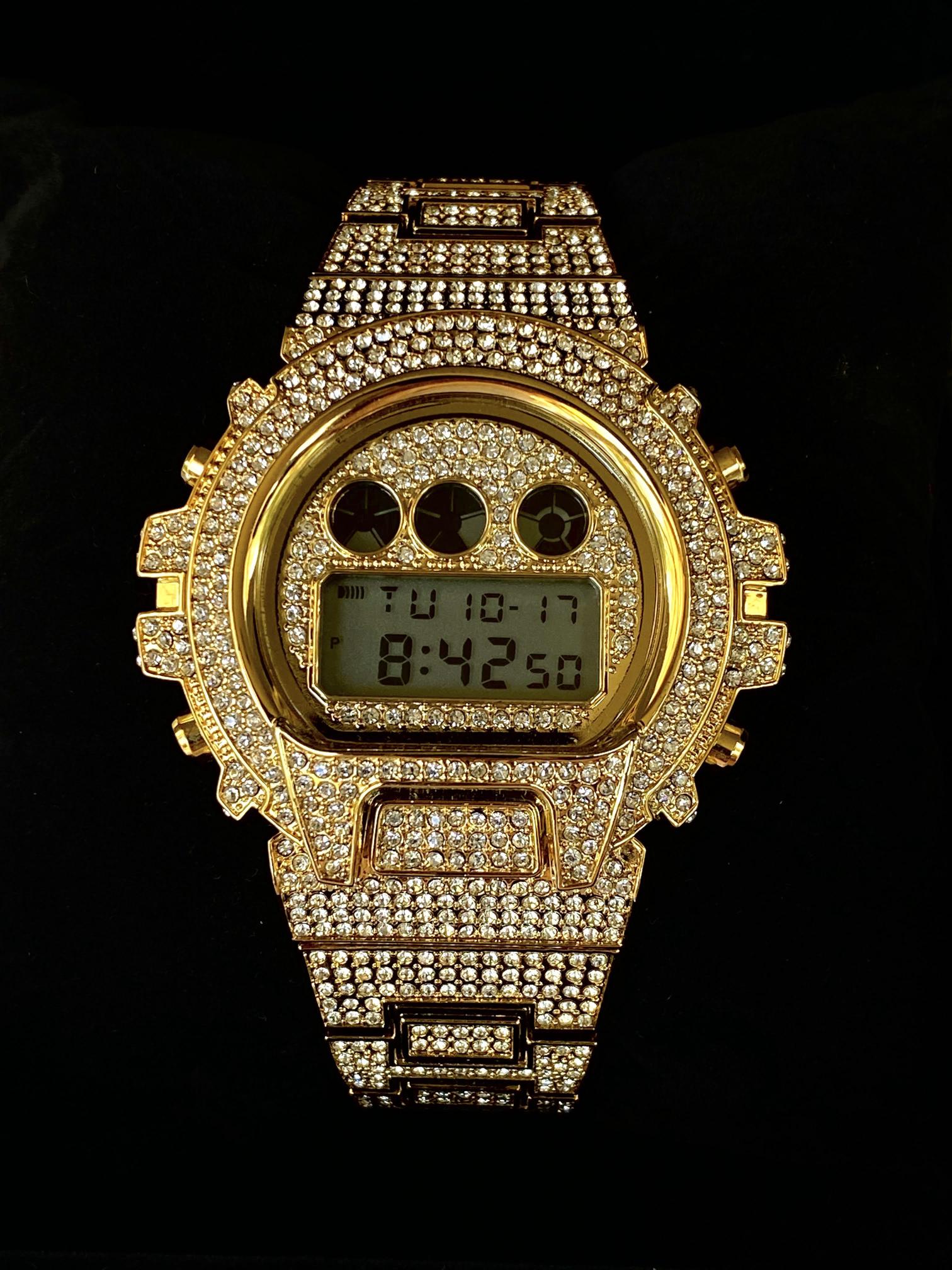 Gold iced-out digital watch with pavé bezel and bracelet – luxury tech streetwear style