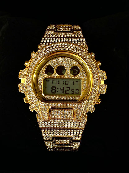 Gold iced-out digital watch with pavé bezel and bracelet – luxury tech streetwear style