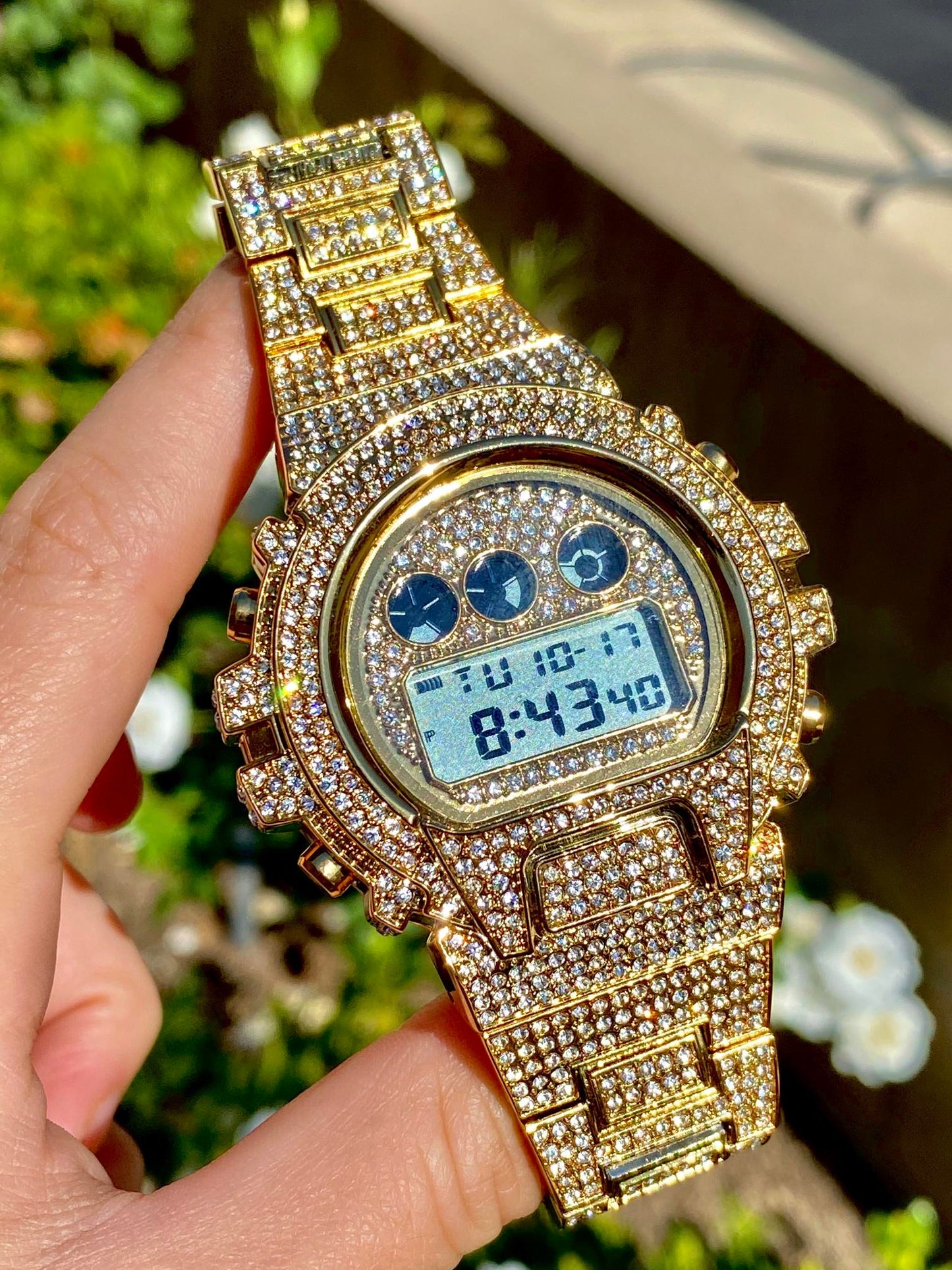 Gold iced-out digital watch with pavé bezel and bracelet – luxury tech streetwear style