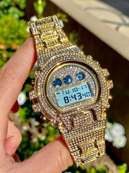 Gold iced-out digital watch with pavé bezel and bracelet – luxury tech streetwear style