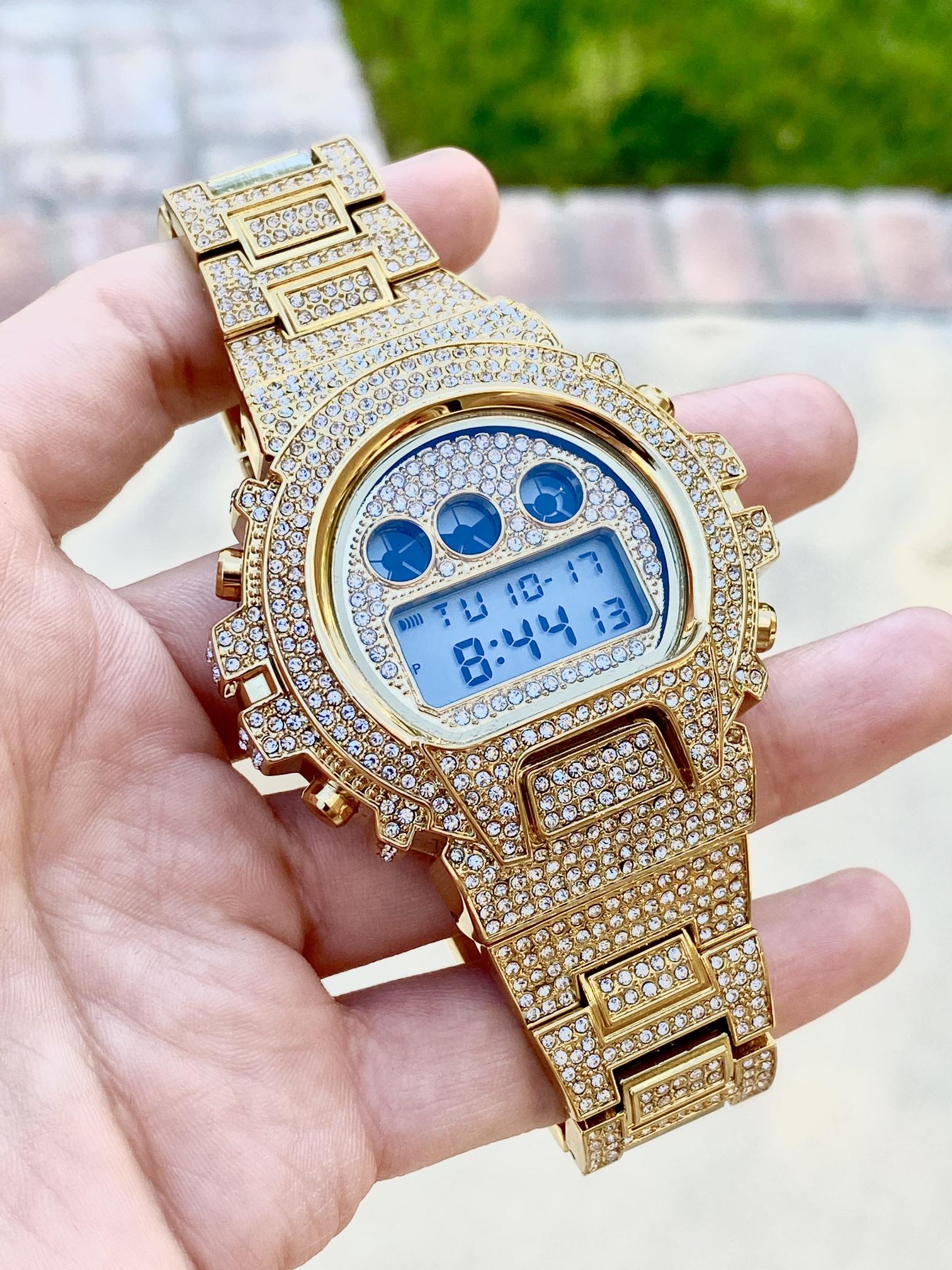 Gold iced-out digital watch with pavé bezel and bracelet – luxury tech streetwear style