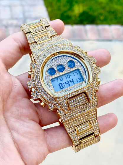 Gold iced-out digital watch with pavé bezel and bracelet – luxury tech streetwear style