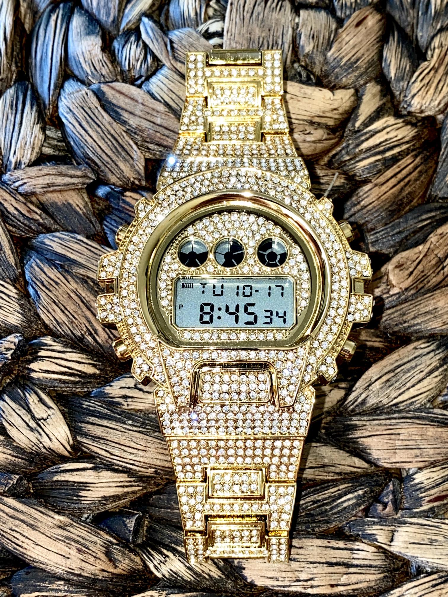 Gold iced-out digital watch with pavé bezel and bracelet – luxury tech streetwear style