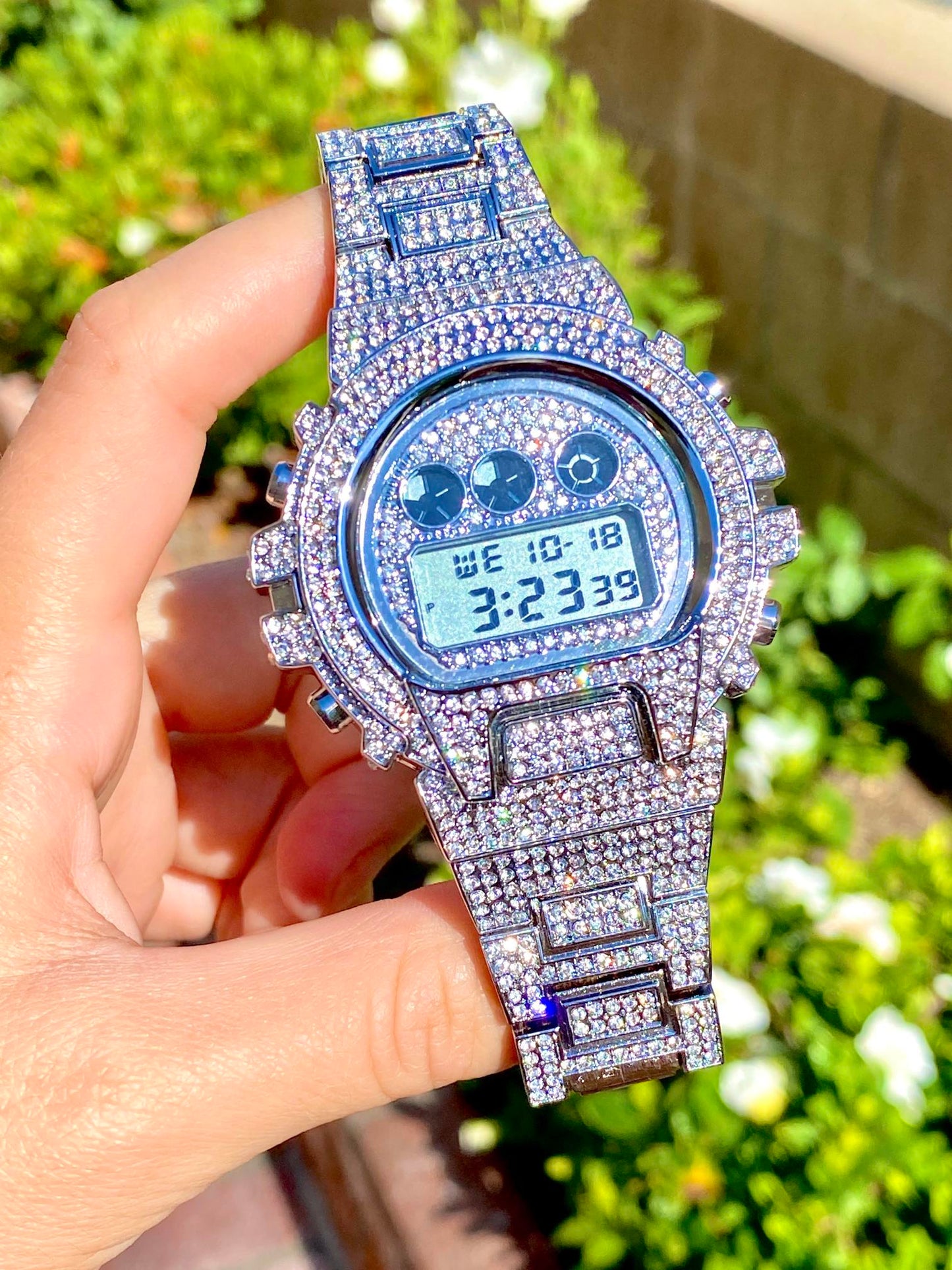 Silver iced-out digital watch with full pavé bezel and bracelet – luxury tech streetwear style