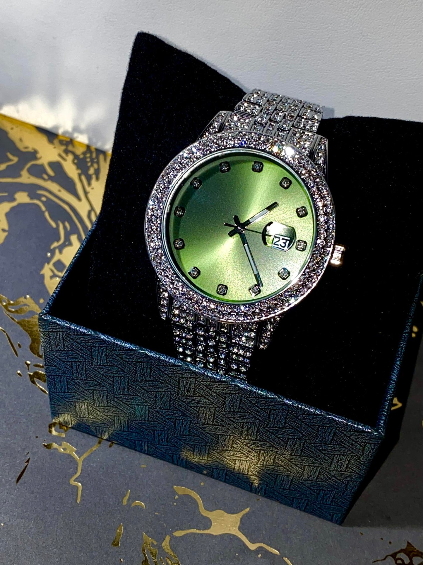 Silver iced-out watch with mint green dial and pavé bracelet – luxury streetwear style