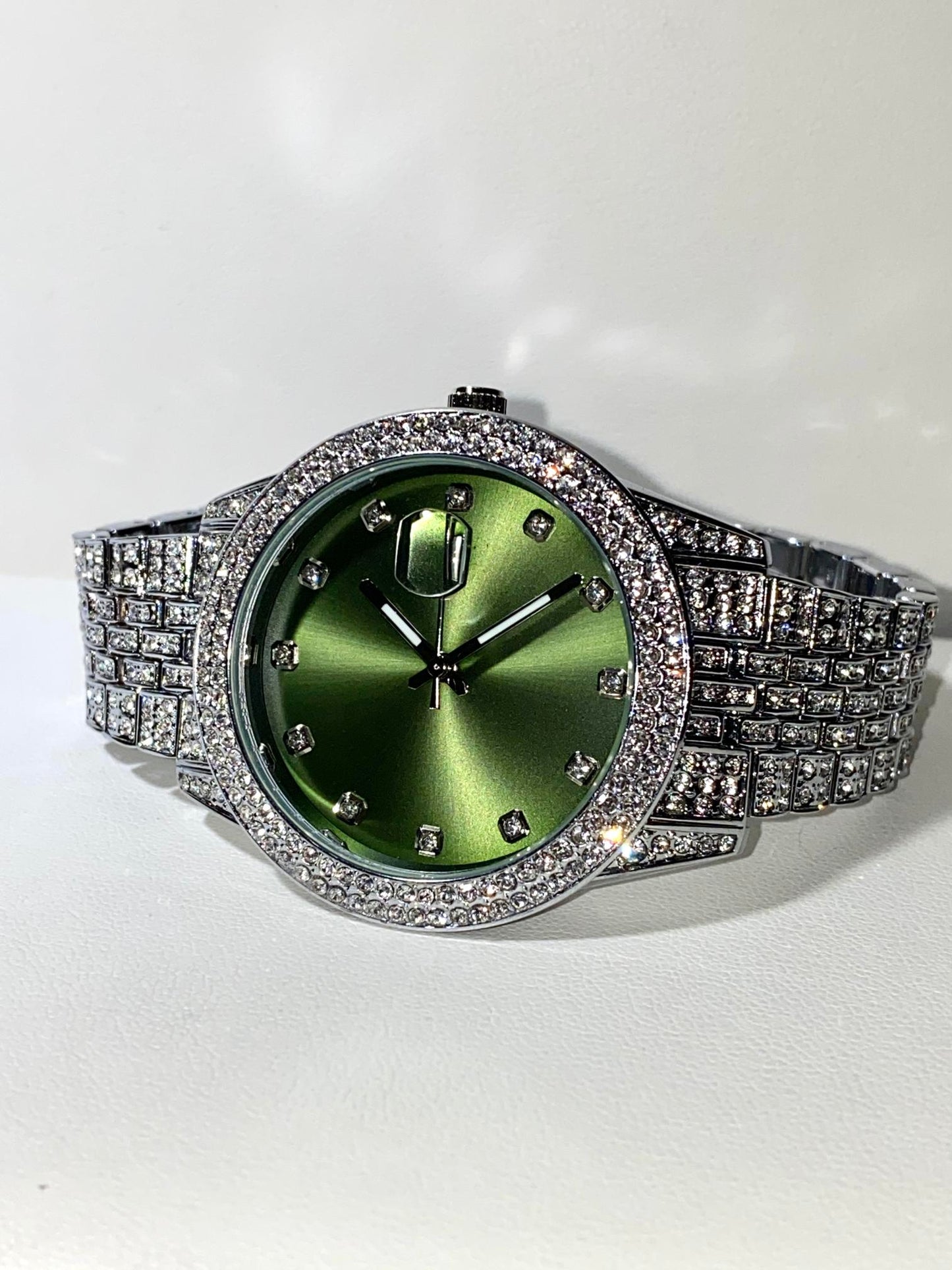 Silver iced-out watch with mint green dial and pavé bracelet – luxury streetwear style