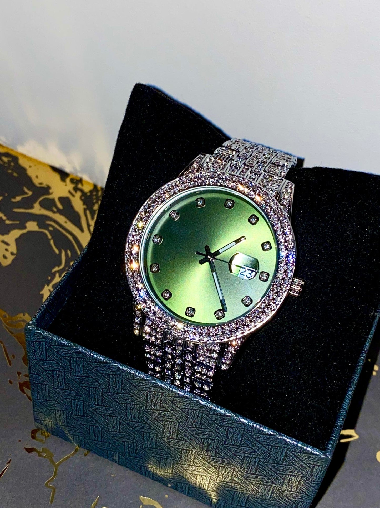 Silver iced-out watch with mint green dial and pavé bracelet – luxury streetwear style