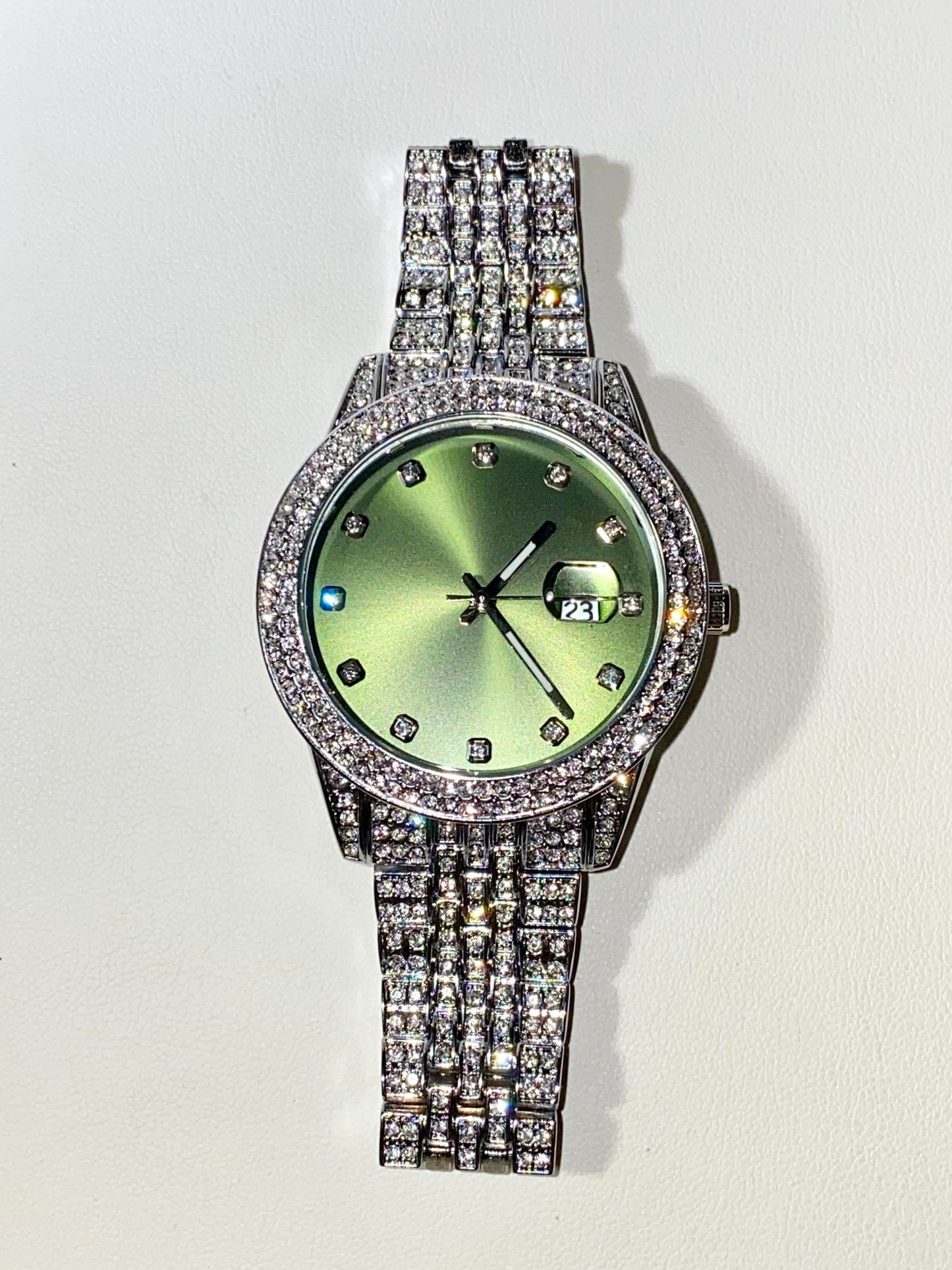 Silver iced-out watch with mint green dial and pavé bracelet – luxury streetwear style