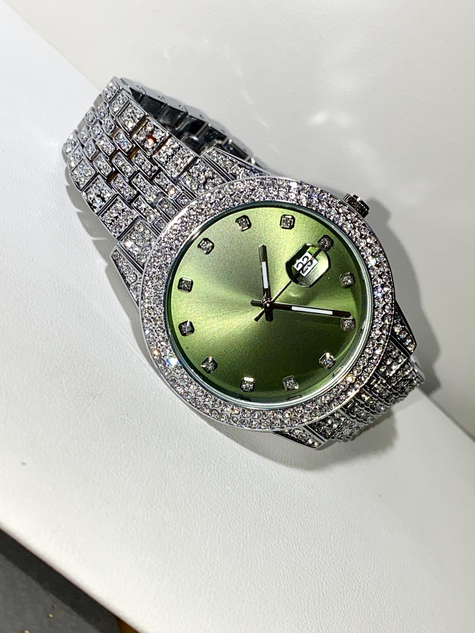 Silver iced-out watch with mint green dial and pavé bracelet – luxury streetwear style