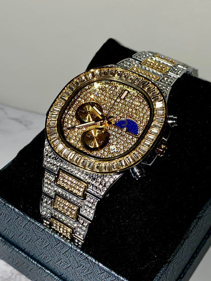 Two-tone iced-out watch with gold dial, moon phase complication, and baguette bezel – luxury diamond timepiece