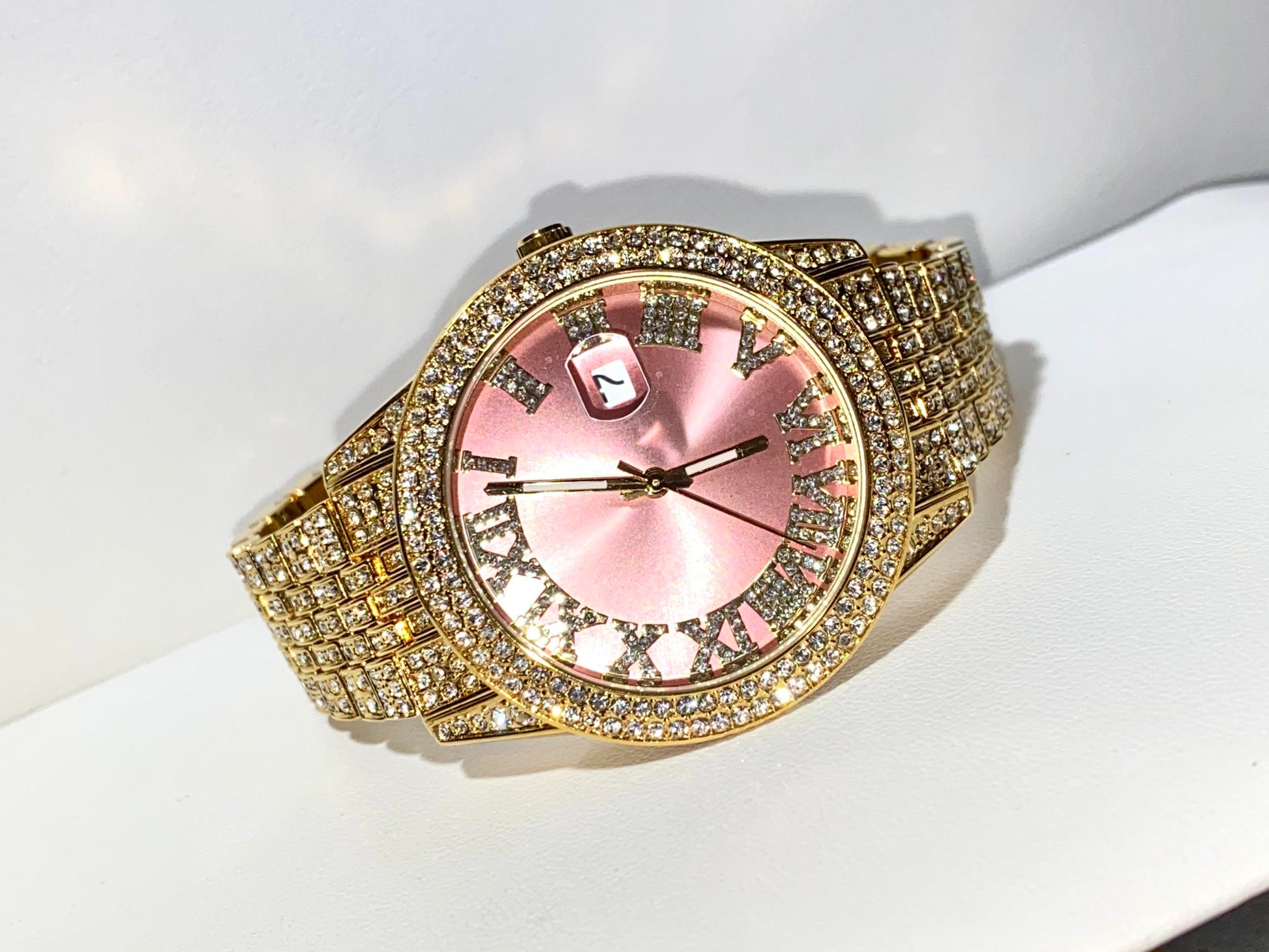 Time Flex Pink Luxe iced watch with Roman numerals and date display – soft glam hero image