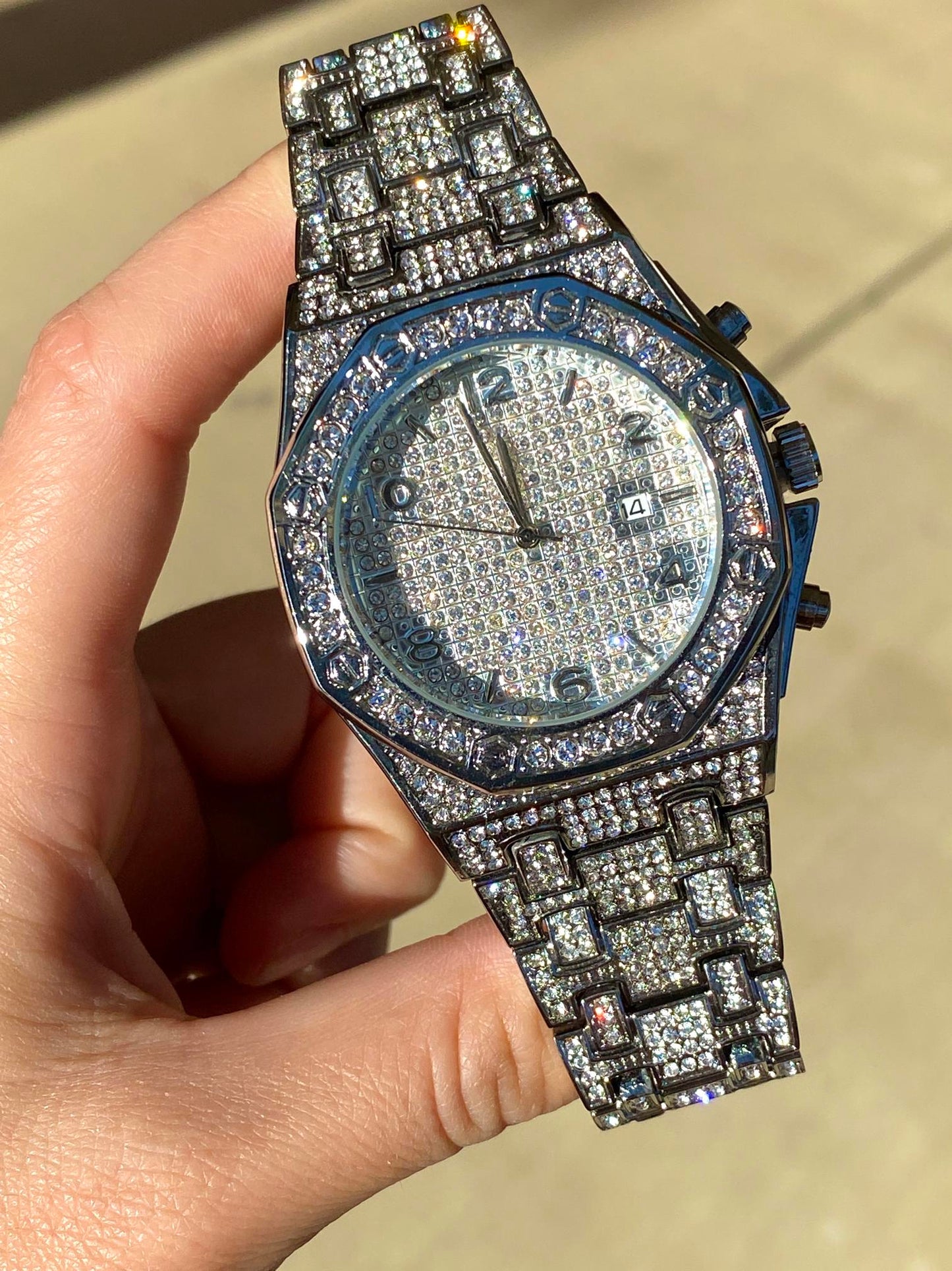 Iced silver octagon watch with pavé dial and chrono details – bold urban luxury design
