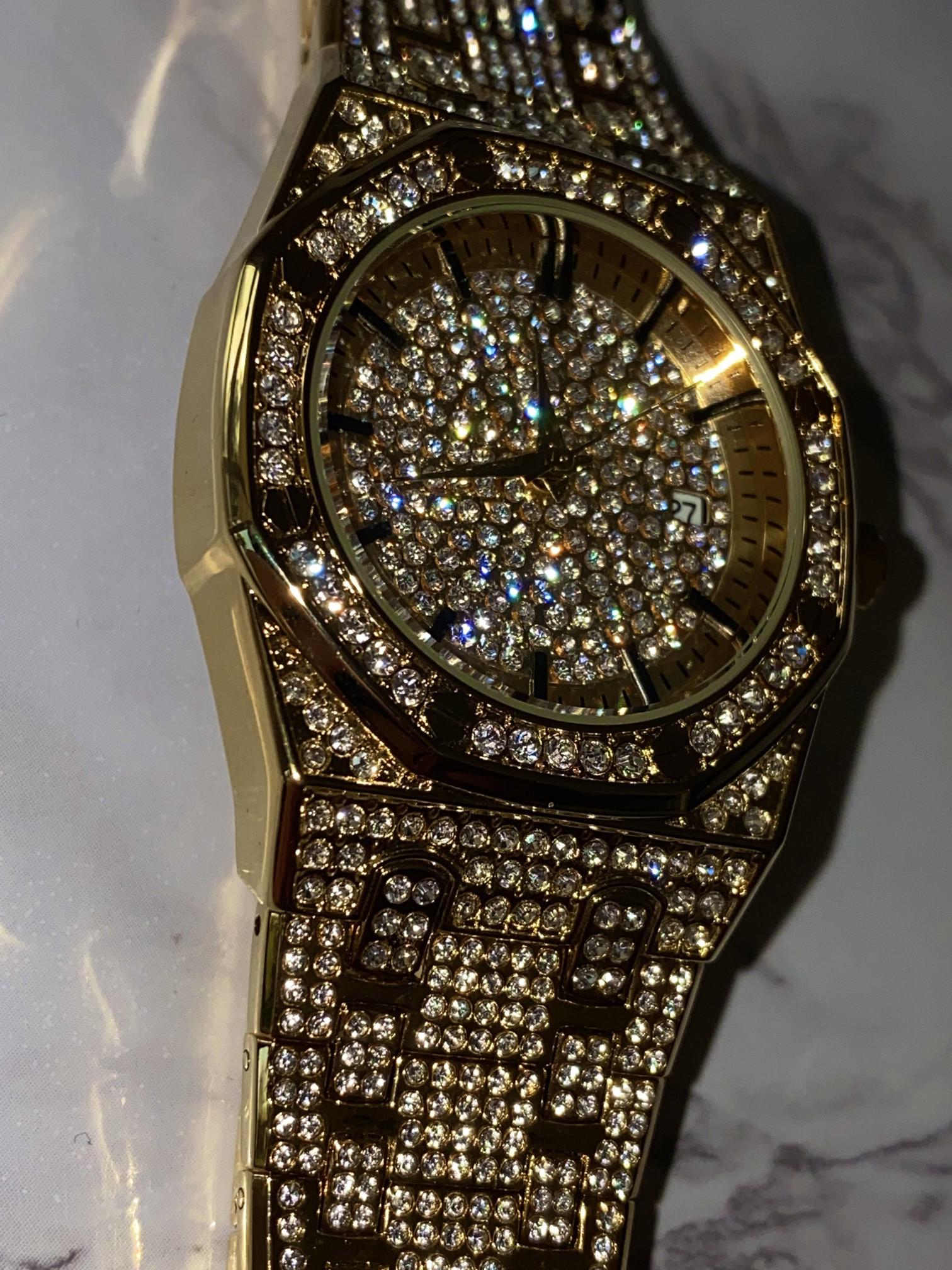 Gold iced-out octagon watch with pavé dial, classic markers, and diamond bracelet – luxury streetwear timepiece