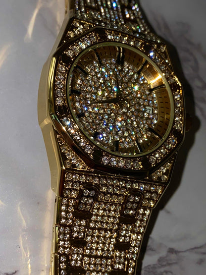 Gold iced-out octagon watch with pavé dial, classic markers, and diamond bracelet – luxury streetwear timepiece